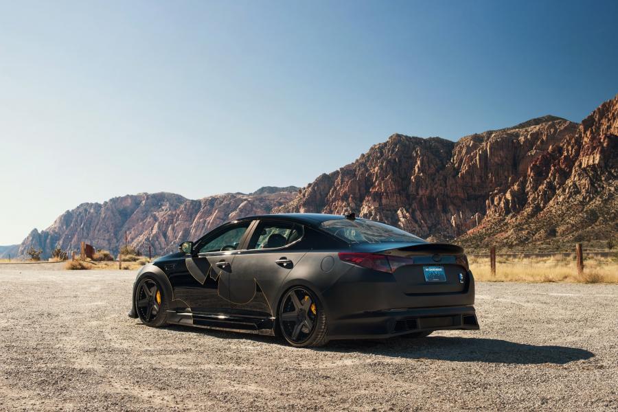  Kia Optima Batman (TF) 2012 года  (фото 9 из 12)
